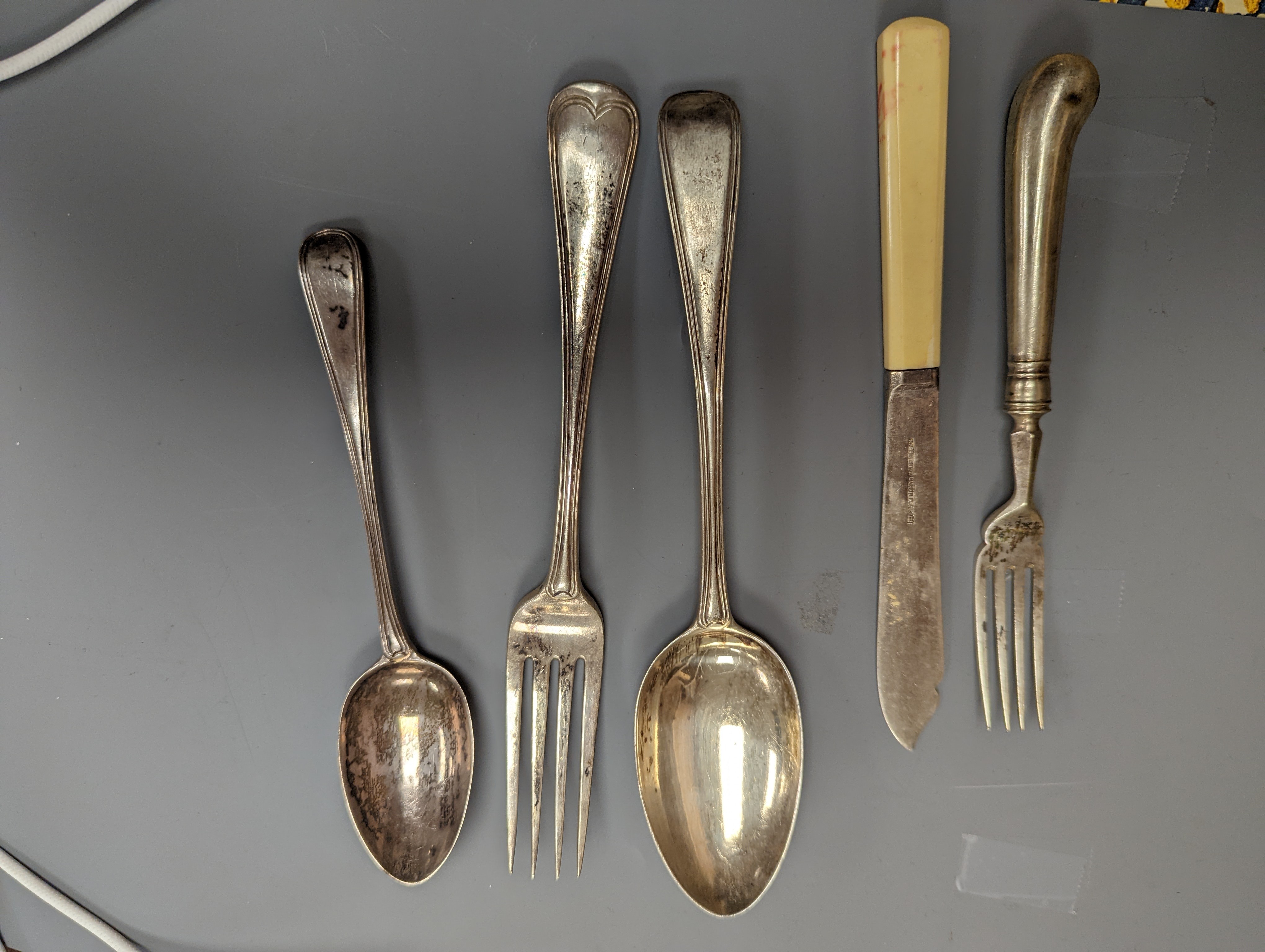 A mixed quantity of 19th century and later silver cutlery, including pistol handled fish eaters and pistol handled steel table and dessert knives, various date and makers, including a set of seventeen George IV table for